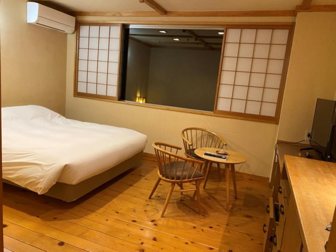 미야마 오안 교리츠 리조트 다카야마 외부 사진 A room at a ryokan