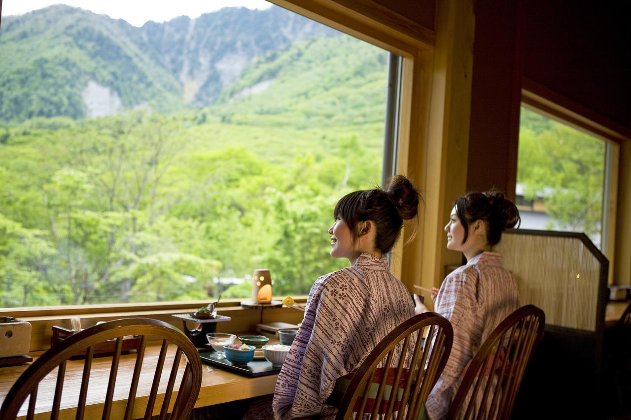 미야마 오안 교리츠 리조트 다카야마 외부 사진 A view of Mount Yōtei from a restaurant in Niseko